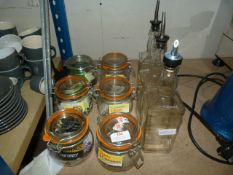 *Three Jack Daniel's Shot Bottles and Six Jars of Assorted Teas