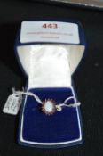 9k Gold Ring with Opal and Rubies