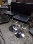 *pair of black gas lift beauticians chairs