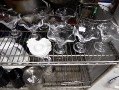 *8 sundae glasses 3 boiled egg plates and two wire baskets
