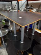 *4 dark wood effect topped dining tables on black and silver circular base