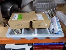 *cutlery tray with several boxes of fluorescent and halogen bulbs