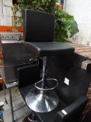*3 black gas lift beauticians chairs on circular chrome base