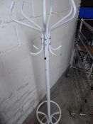 *white metal hat and coat stand