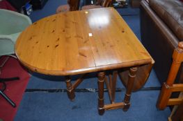 Pine Drop Leaf Oval Dining Table