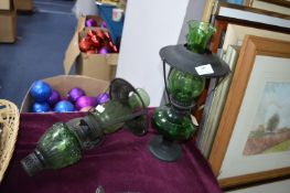 Two Retro Style Green Glass Oil Lamps