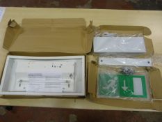 Two Emergency Exit Signs