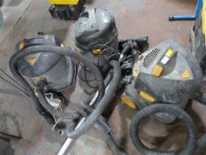 *Three Titan Vacuums