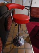 * bright red and chrome hi bar stool