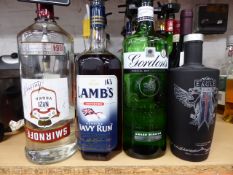 * half bottle of vodka full bottle of navy rum half bottle gardens gin half bottle legal gyn