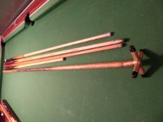 * 4 assorted pool ques and a spider rest