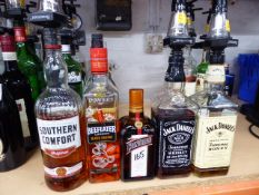 * 5 bottles bourbon etc , southern comfort three-quarter , cointeau three-quarter , gin 2\3, jack