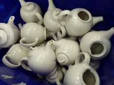 * quantity of large teapots approximately 25 and 12 white plates