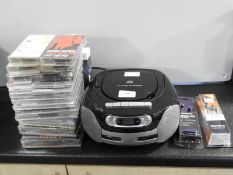 Portable CD Player, CDs, Headphones, Cassette Tape