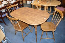 Light Oak Effect Oval Dining Table with Four Chair