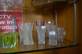 Nine Glass Vases and a Beaker
