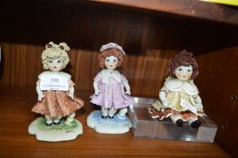 Three Pottery Doll Figures