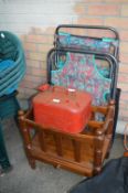 Folding Garden Lounger, Petrol Can, and a Newspape