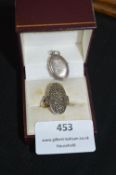 Silver and Marcasite Ring plus Silver Locket