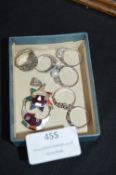 Six Sterling Silver Rings and a Pendant