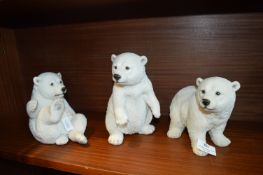 Three Polar Bear Figures