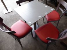 * set of table and 4 chairs, grey wood framed chairs with red upholstered pad, stainless brushed