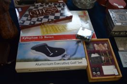 Chess Set, Xylophone, Decorative Golf Set and a Do