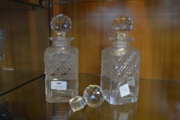 Two Cut Glass Decanters and a Spare Stopper