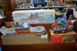 Wonder Locomotive Tinplate Train and a Toy Motorcy