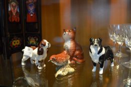 Two Beswick Dogs, a Cat, and a Bird