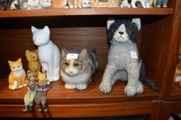 Cat Ornaments and a Stuffed Cat Doorstop