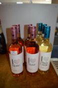 Four Bottles of Rose Wine and Three Bottles of Pin
