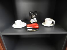 *Two Coffee Cups and a Garlic Peeler and Pureer