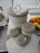 *Three Storage Tins