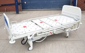 1 x Huntleigh CONTOURA Electric Hospital Bed - Features Rise/Fall 3-Way Profiling, Side Rails,