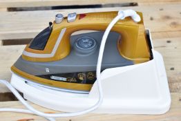 Assorted Collection of Laundry Equipment Including Phoenix Gold Steam Iron, Two Ironing Boards and