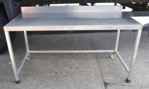 1 x Stainless Steel Prep Table With Upstand and Castor Wheels - Recently Removed From Major Supermar