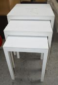 A Set Of 3 x Commercial Nesting Display Tables In White With Sturdy Metal Frames - Ex-Display