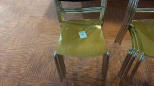 Stack of 4 wooden chairs