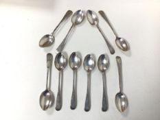 A set of ten 1900 Sheffield silver coffee spoons, with foliate decoration to stems and monogram (