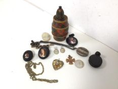 A collection of costume jewellery including brooches with painted Lady portraits, cameos, an