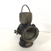 A 1920s/30s King of the Road lamp with clear glass to front and red to one side, bears plaque