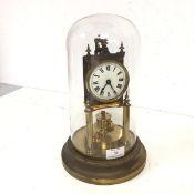 A late 19thc gilt metal skeleton clock, the enamel dial with roman numerals, stamped GB verso, on