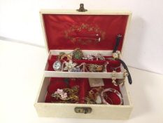 A collection of costume jewellery including brooches, pendants, necklaces, a lady's wristwatch,