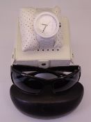 DIESEL DOUBLE DOWN S44 WRISTWATCH and a pair of Prada sunglasses, the watch in matt white with