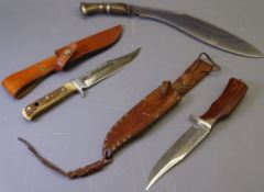 THREE HUNTING KNIVES including a horn handled example with finger guard, the blade marked '