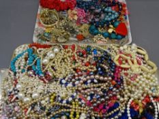 VENETIAN & OTHER COSTUME JEWELLERY and necklaces, a large quantity on two trays