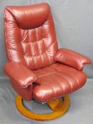 ULTRA MODERN RED LEATHER EFFECT STRESSLESS ARMCHAIR with reclining action on a swivel base, 102.5cms