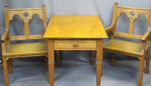 CIRCA 1900 GOTHIC OAK STYLE ARMCHAIRS, a pair and a rectangular top table with twin-end drawers on