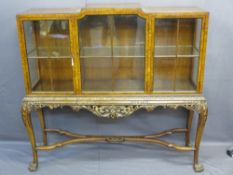 CHIPPENDALE STYLE WALNUT DISPLAY CABINET ON STAND having three opening doors and interior glass
